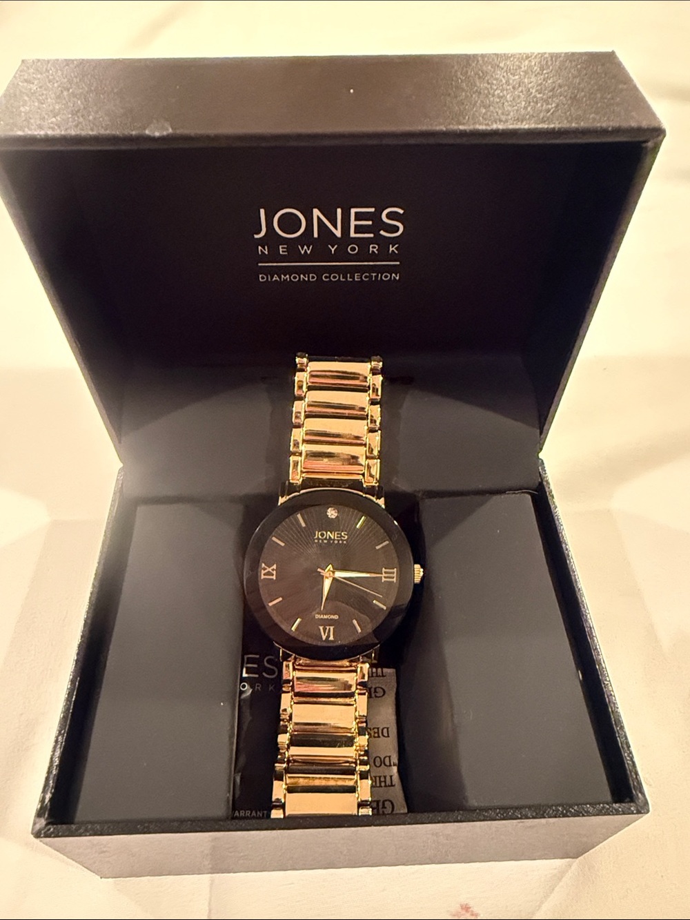 Jones New York Gold Tone Watch with Black Dial